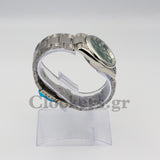 OYSTER PERPETUAL 36 REFERENCE 124300 GREEN DIAL 2AA